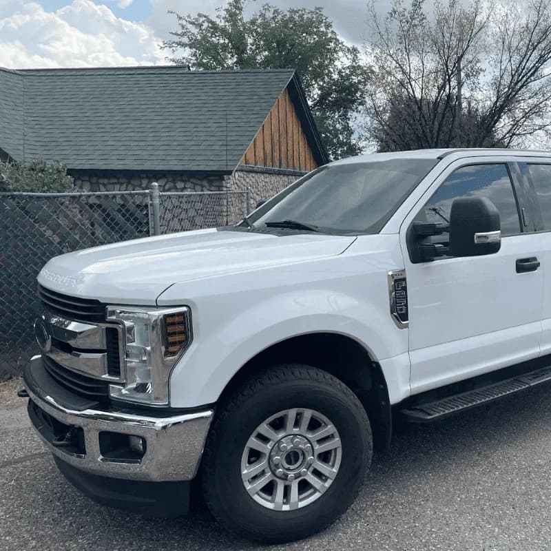 White Ford Super Duty side window tint